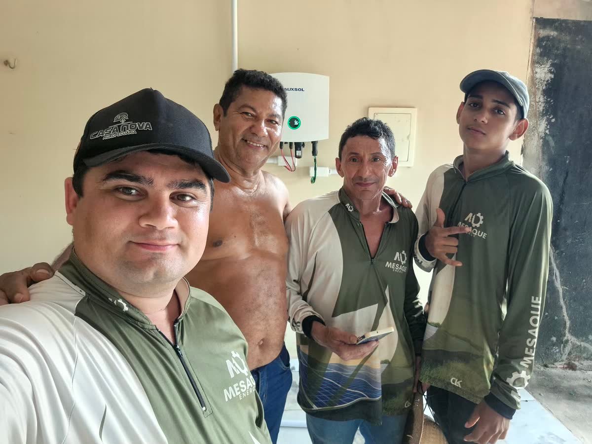 Equipe da Mesaque com o cliente após a entrega do sistema